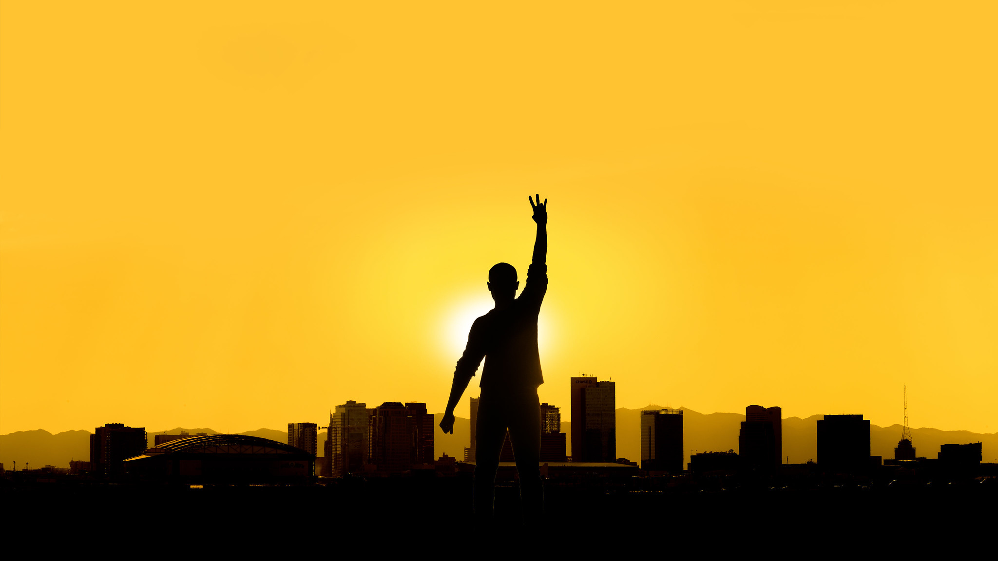 ASU student with gold background